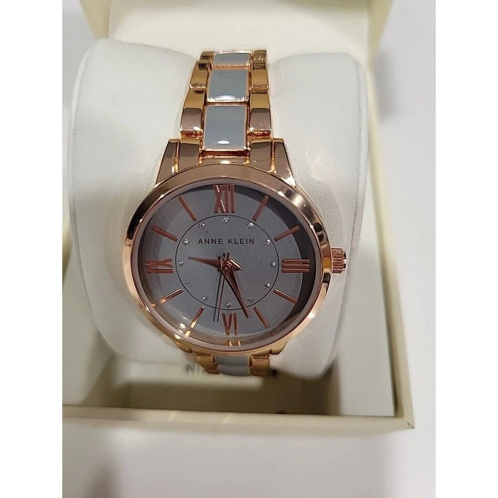 Anne Klein Women's Rose Gold-Tone and Light Pink Resin Bracelet Watch